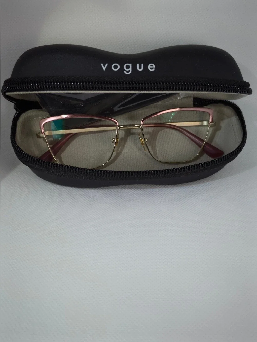 Vogue. Stylish Cat-Eye Metal Frame Glasses in Rose Gold Silk Texture.